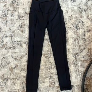 Lululemon black leggings with side pockets size 6